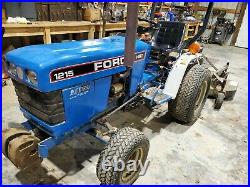 FORD 1215 Tractor with Woods RD 60 finishing mower Only 544 hrs