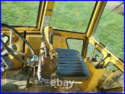 Ford 555B backhoe tractor 7' loader 63 hp diesel 2wd Cab with heat AC 24 bucket