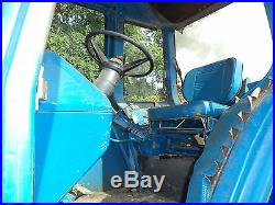 Ford 7700 tractor with loader, cab, Diesel, PTO, heater, air two buckets
