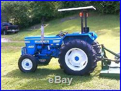 Ford Long 460. Model 1529. Runs Excellent. WITH 5 FOOT BUSH-HOG