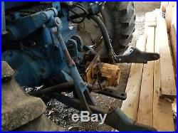 Ford TW-10 Tractor with hydro brush cutter, cab heat, ac, works