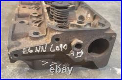 Ford Tractor 4 Cylinder Head Casting # E6NN6090AB (Used In Rough Shape) Ford Tractor 4 Cylinder Head Casting # E6NN6090AB (Used In Rough Shape)