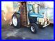 L@@k FORD 6610 TRACTOR WITH THREE MOTT MOWERS AND AC